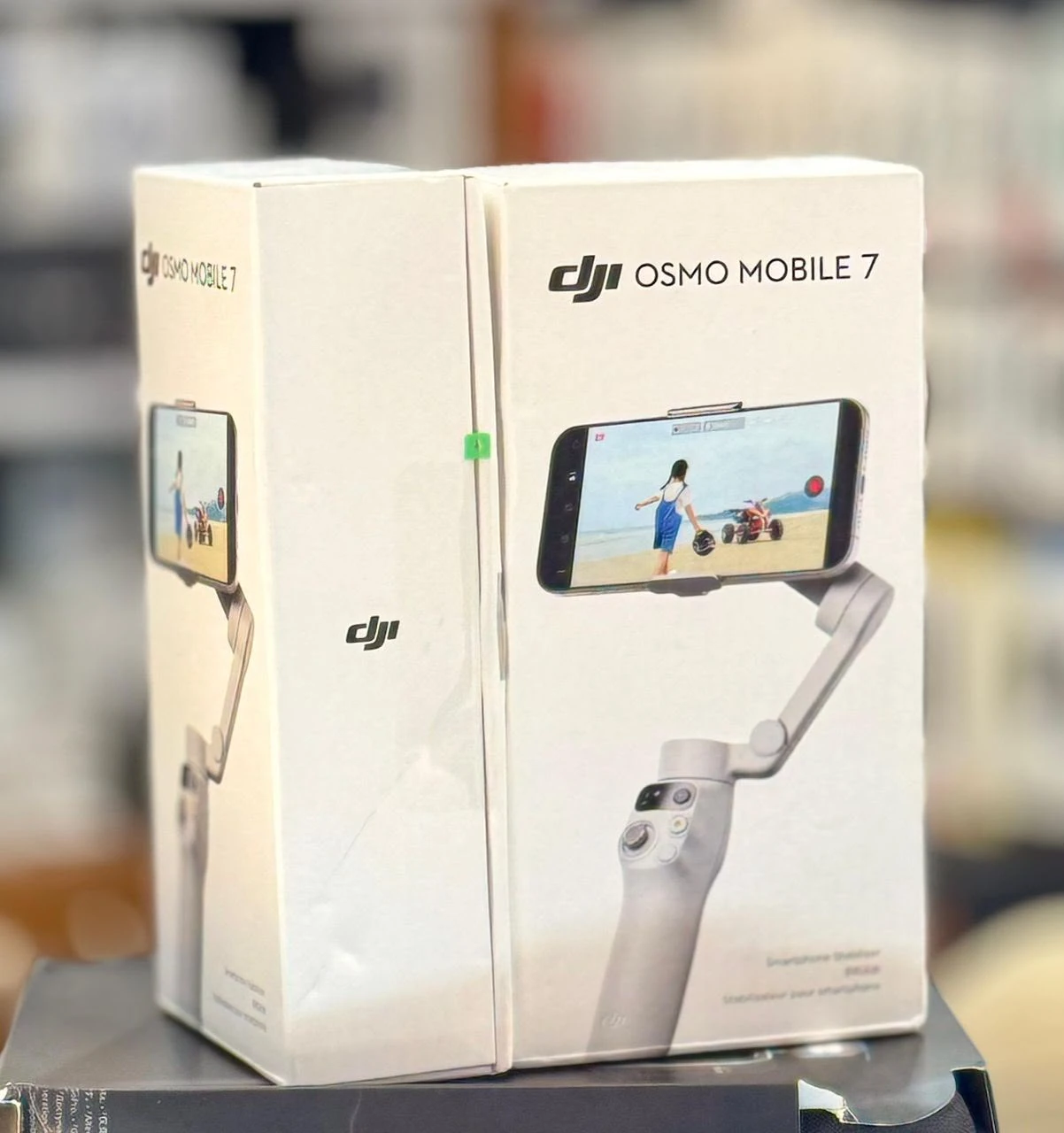 Sealed DJI Osmo Mobile 7 smartphone gimbal retail boxes in EMOS IT SERVICES stock