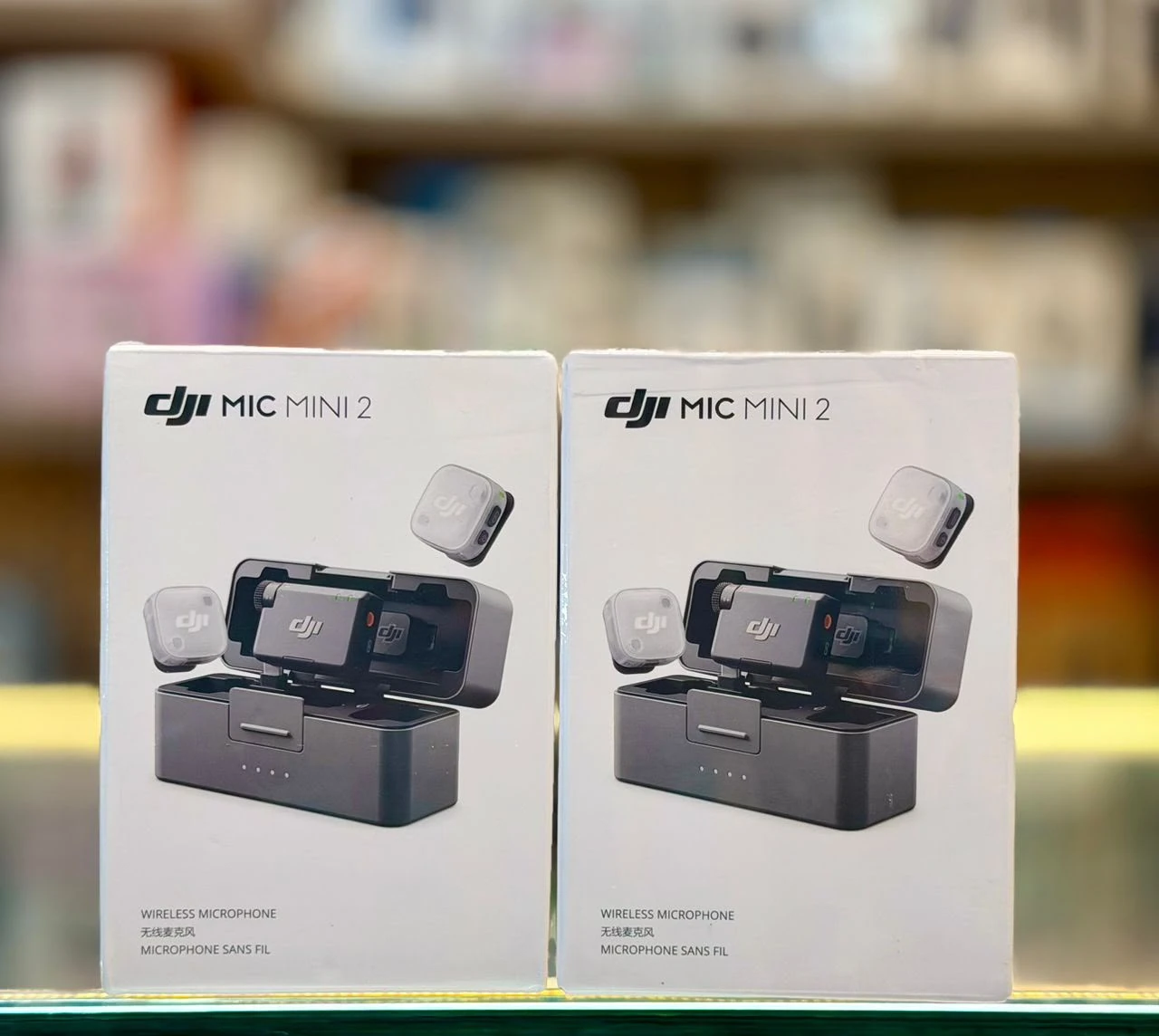 Sealed DJI Mic Mini 2 wireless microphone retail boxes in EMOS IT SERVICES stock