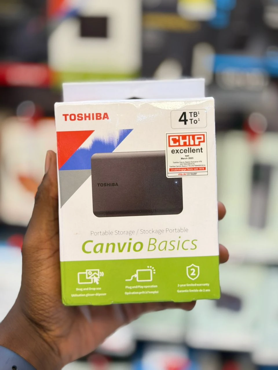 Toshiba Canvio Basics 4TB portable external hard drive retail packaging in EMOS IT SERVICES stock